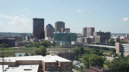 Dayton, Ohio wide shot skyline with drone video moving up. photo