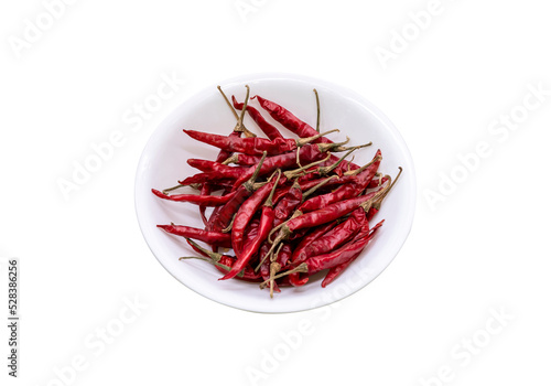 red chili peppers on the white plate. isolated on white