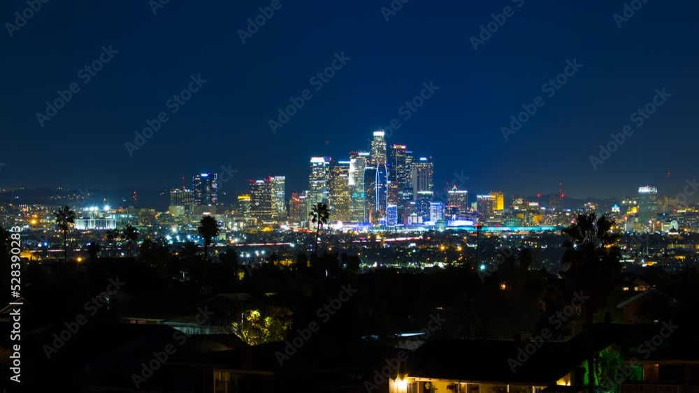 Aerial Time Lapse Lockdown Shot Of Modern Office Buildings Against Clear Sky In City At Night - Los Angeles, California Aerial Time Lapse Lockdown Shot Of Modern Office Buildings Against Clear Sky In City At Night - Los Angeles, California