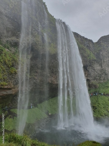 Vertical shot of the Seljalandsfoss waterfall in Iceland