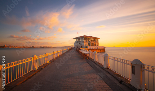 General view from Moda pier in istanbul. One of the symbols of Kadıkoy, the historical Moda Pier built 100 years ago by architect Vedat Tek. photo