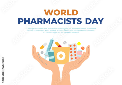 World pharmacists day background with drugs on opened hand.