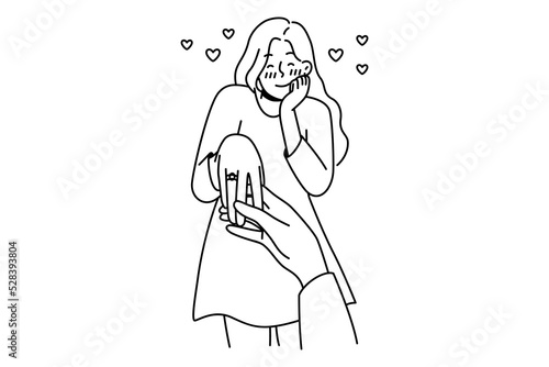 Happy young woman with ring on finger is engaged. Man holding female lover hand make marriage proposal. Ove and relationship. Vector illustration. 