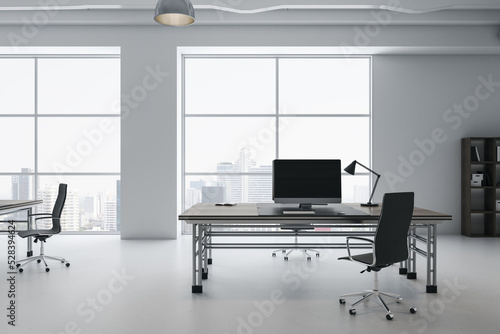 Contemporary white concrete coworking office interior with furniture, bookcase, window with city view. 3D Rendering.