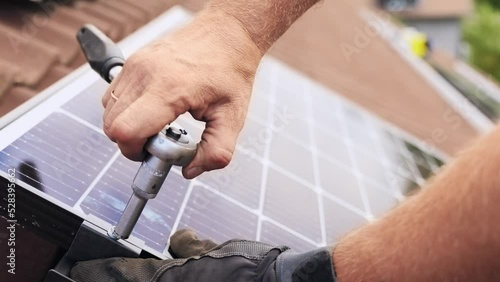 Wallpaper Mural Securing solar panel bolts with wrench tool installation  Torontodigital.ca