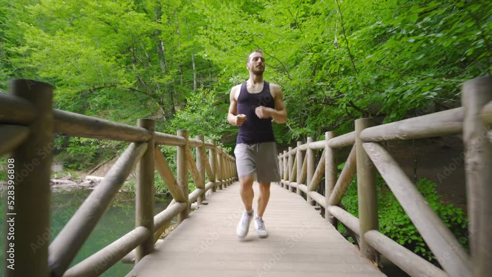Jogging outdoors.
Sports man jogging in nature.
Jogging outdoors.
Sports man jogging in nature.