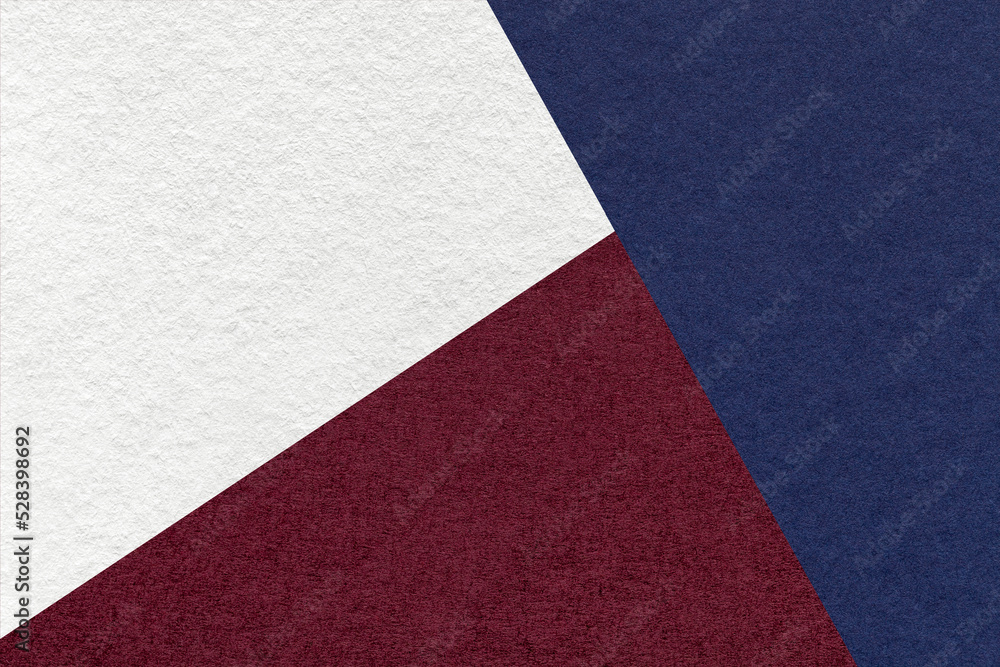 Fototapeta premium Texture of craft navy blue, white and dark wine shade color paper background. Vintage abstract indigo cardboard
