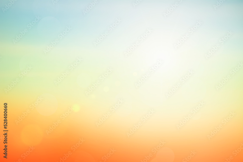 Abstract blurred sunlight beach colorful blurred bokeh background with retro effect autumn sunset sky have blue bright, white, and color orange calm.	