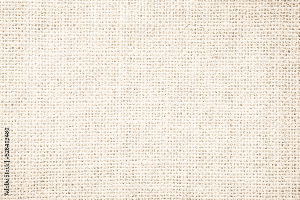 Jute hessian sackcloth canvas woven texture pattern background in light beige cream brown color blank empty Jute hessian sackcloth canvas woven texture pattern background in light beige cream brown color blank empty