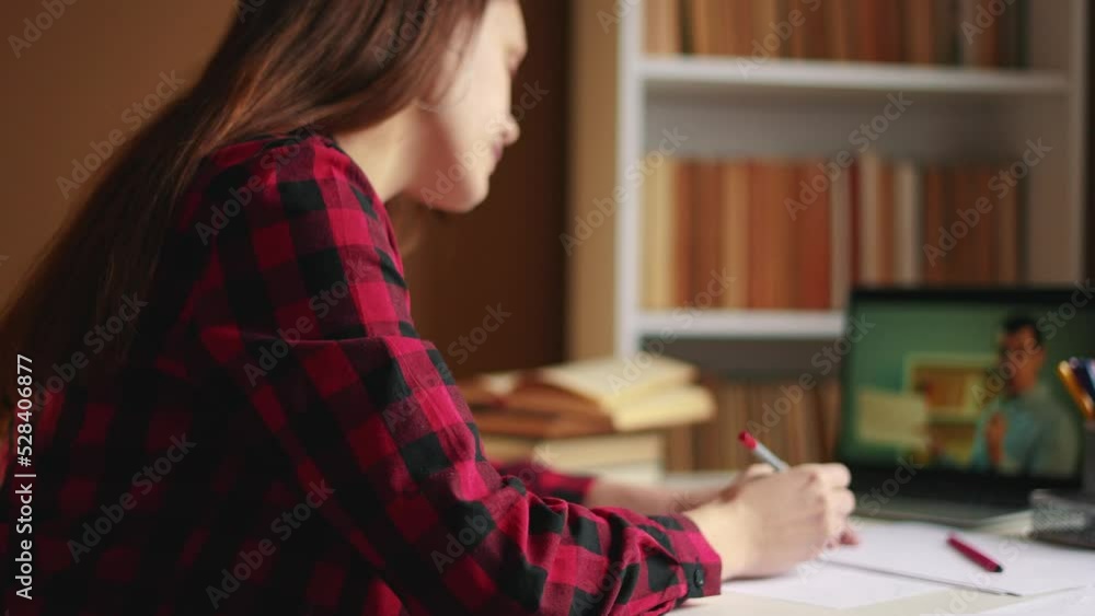 distance learning online education. girl student studying at home on a ...