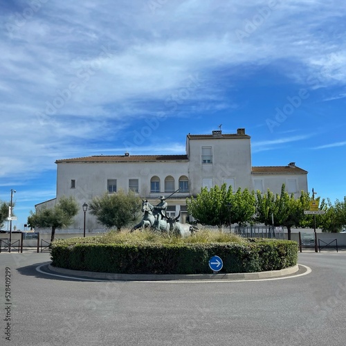 Matador and bull statue on a roundabout, Saintes-Maries-de-la-Mer, Camargue, Bouches du Rhone, Provence-Alpes-Cote d'Azur, France photo