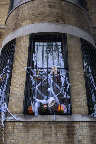 Window decorated with halloween decorations © othersideofmysight