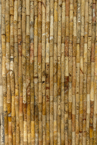 Stone wall flooring ceramic tile, faience patterns, texture, background. Bamboo stone wall ceramic brown colour.