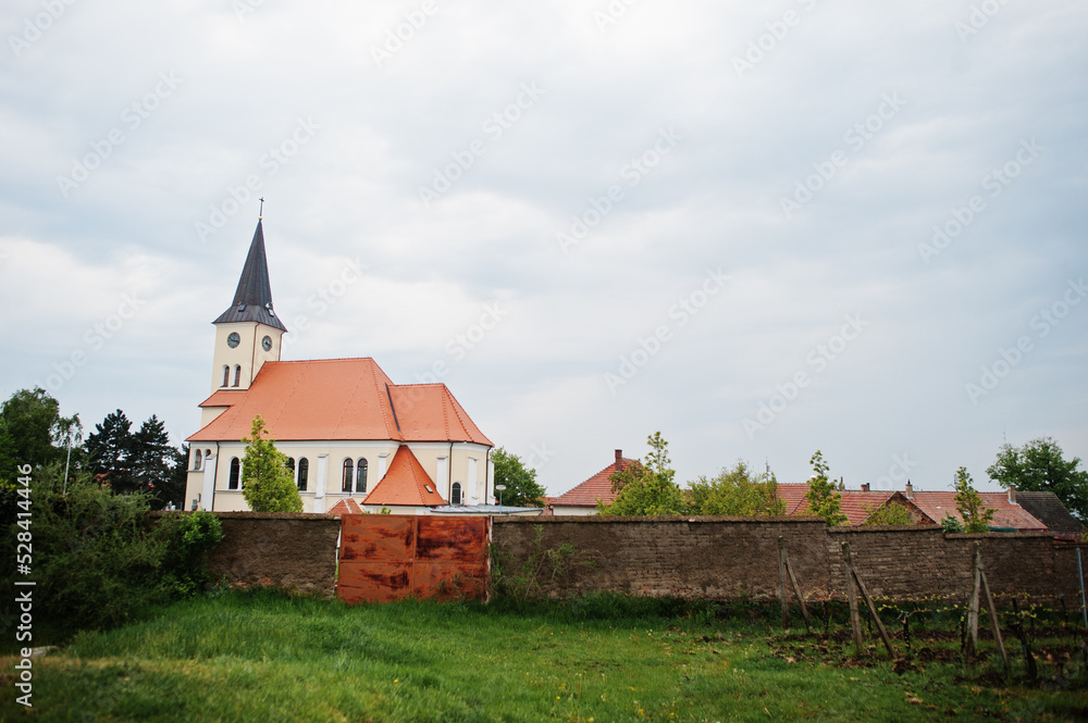 Fototapeta premium Church with wine fields outdoor at Vrbice, Czech Republic.