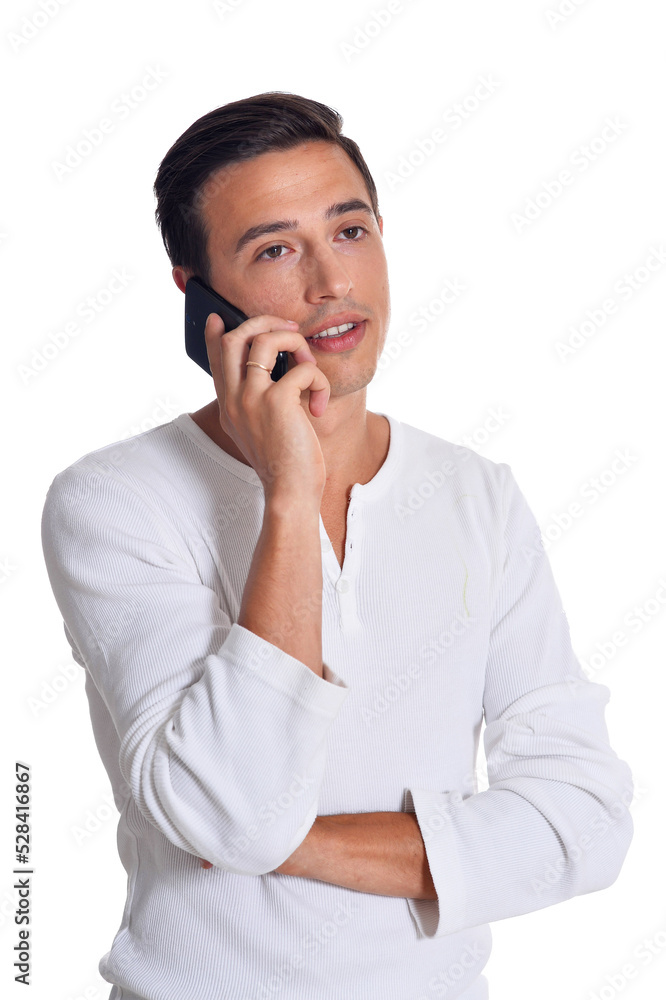 portrait of handsome young man in white clothing talking on smartphone portrait of handsome young man in white clothing talking on smartphone