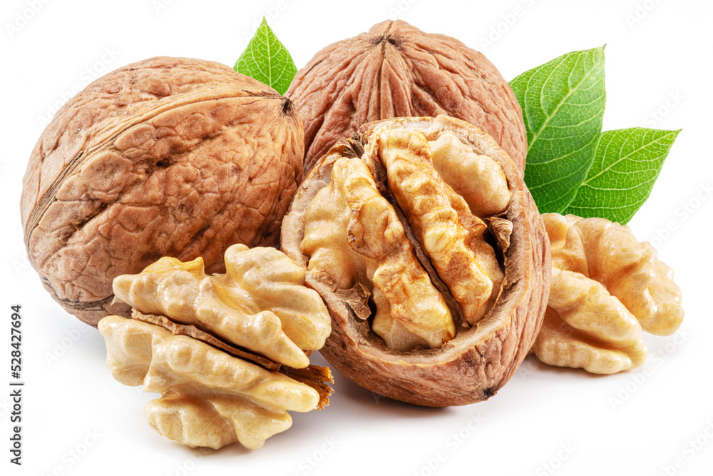 Walnuts, walnut kernel and green leaves isolated on white background. Walnuts, walnut kernel and green leaves isolated on white background.