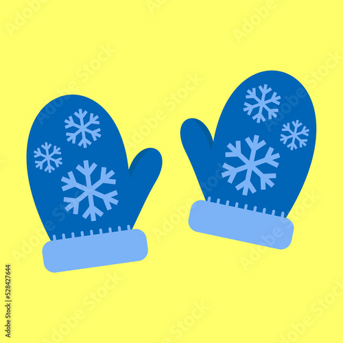 blue knitted mittens on a yellow background