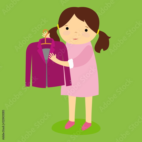 girl holding a hanger with a jacket