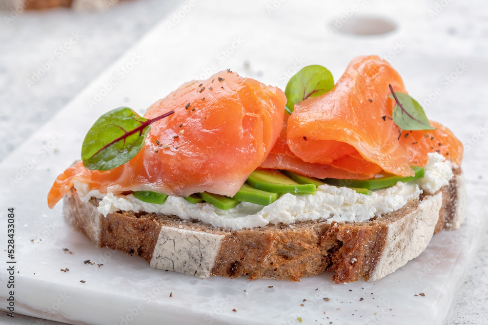 Smoked salmon and avocado on toast , Breakfast food Smoked salmon and avocado on toast , Breakfast food