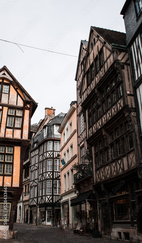 Street scene with historical buildings in Rouen France. Old traditional houses normandy.