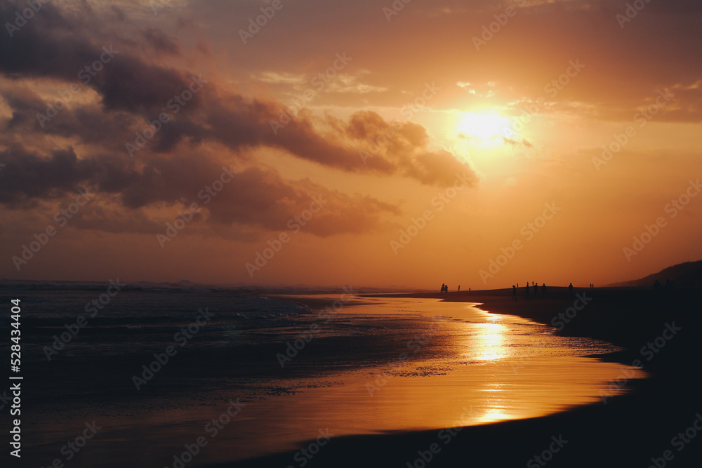 Seascape with clear sky and waves on sunset