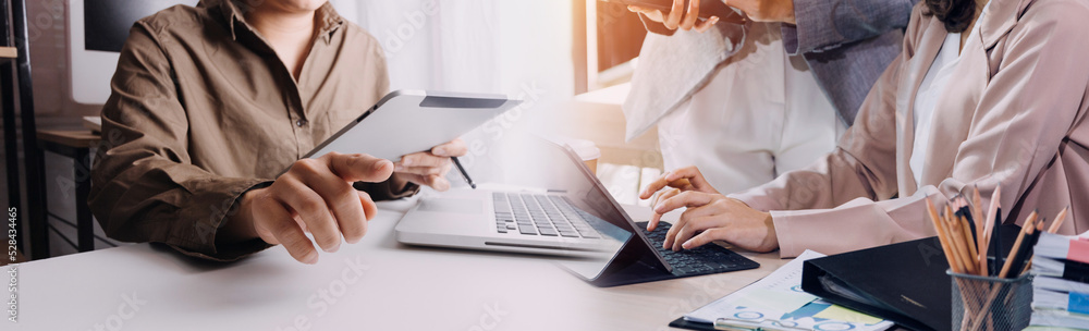 legal and businessman advisor, two business people talking, planning analyze investment and marketing on tablet in office. legal and businessman advisor, two business people talking, planning analyze investment and marketing on tablet in office.