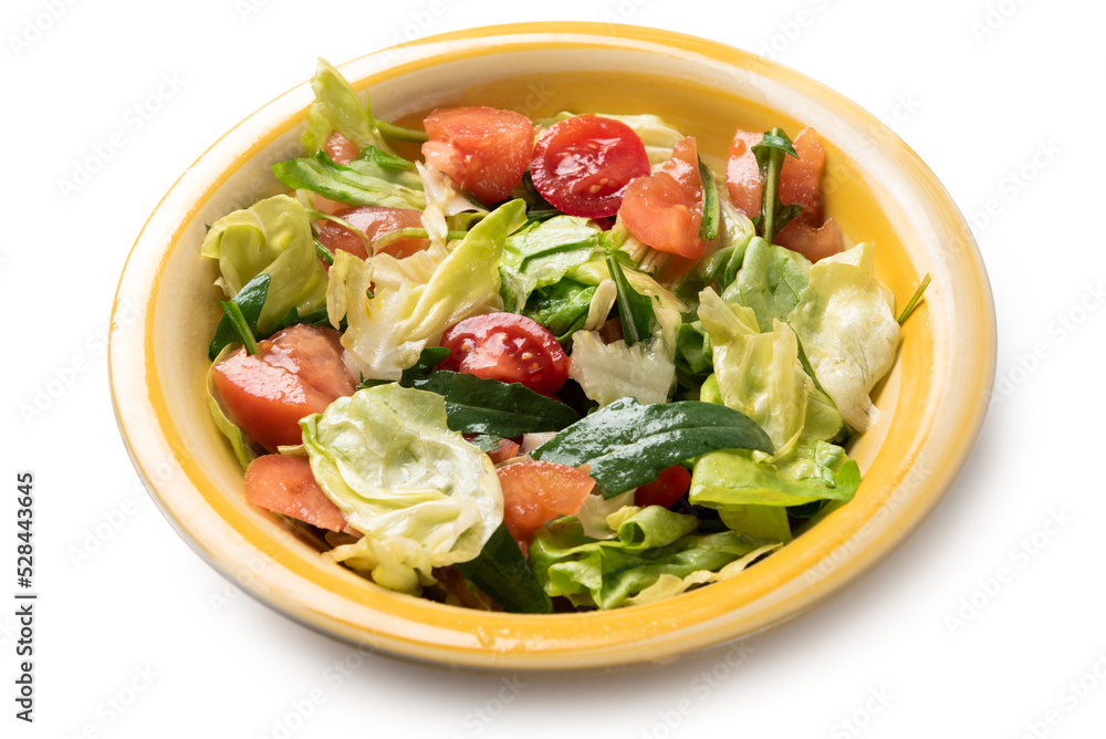 Piatto di insalata mista con lattuga, pomodoro, rucola e olio di oliva Piatto di insalata mista con lattuga, pomodoro, rucola e olio di oliva