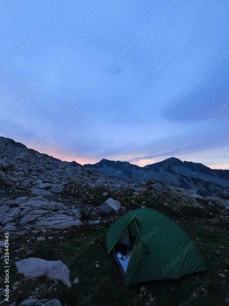 camping at dusk in mountains