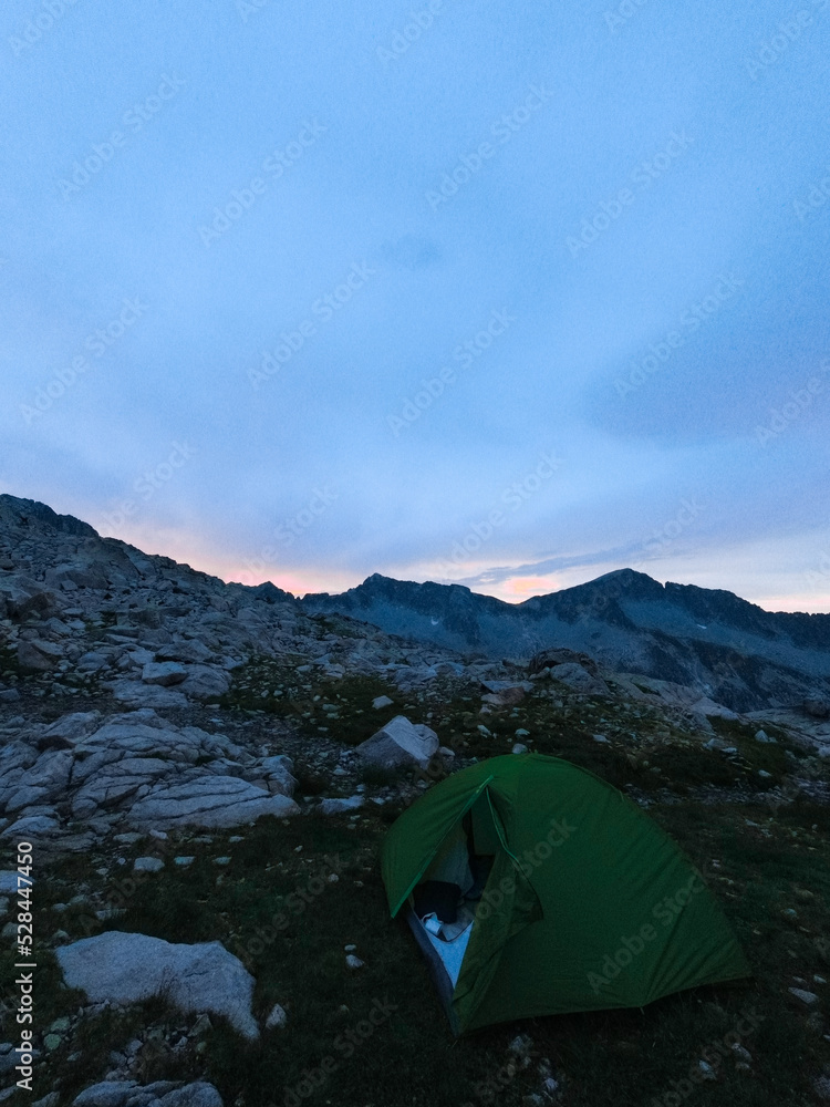 camping at dusk in mountains