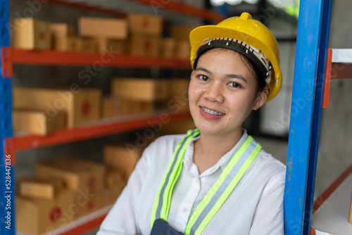 Industrial asian worker women in factory, worker working in warehouse stock checking. supervisor team control and management. Business factory industry concept. logistics warehouse people. © PaeGAG