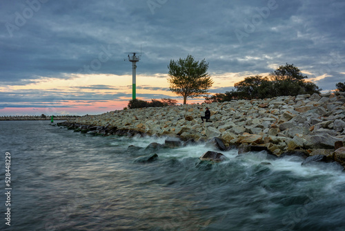 Sunset on the beach of the Baltic Sea in Gdansk, Poland