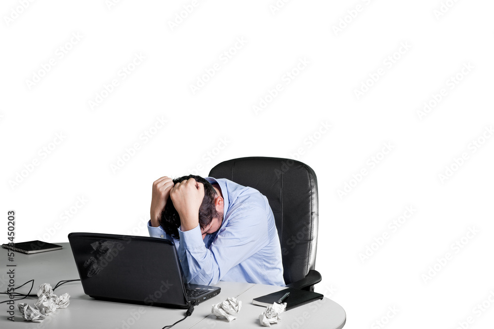 A Frustrated and desperate businessman in his office isolated on white background A Frustrated and desperate businessman in his office isolated on white background
