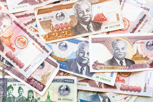 Top view Laos money kip banknotes, LAK, Laos Kip banknotes background. Money background. Laos currency, Kip. Pattern texture and background of Laos Kip money. photo