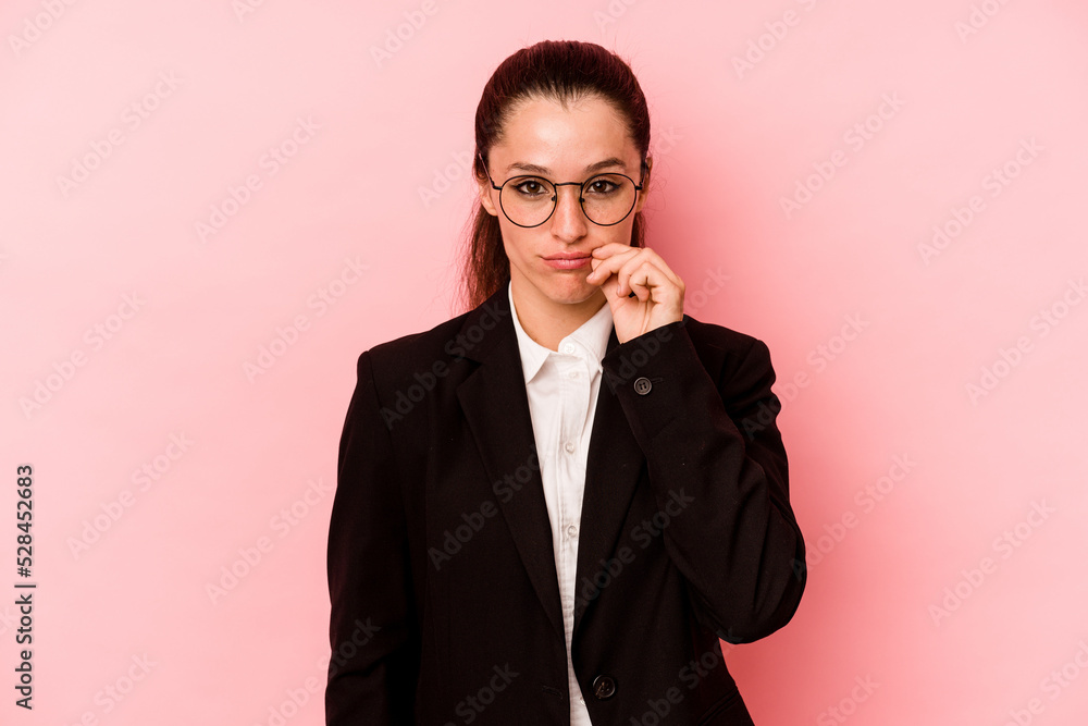 Young business caucasian woman isolated on pink background with fingers on lips keeping a secret. Young business caucasian woman isolated on pink background with fingers on lips keeping a secret.