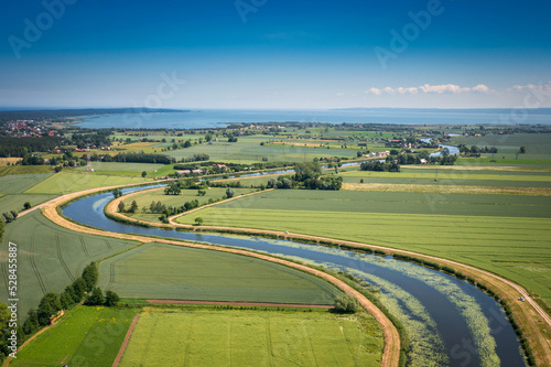 Summer scenery of Sztutowo by the Wisla Krolewiecka river, Pomerania. Poland photo