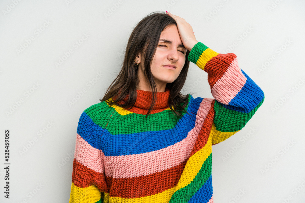 Young caucasian woman isolated on white background forgetting something, slapping forehead with palm and closing eyes. Young caucasian woman isolated on white background forgetting something, slapping forehead with palm and closing eyes.