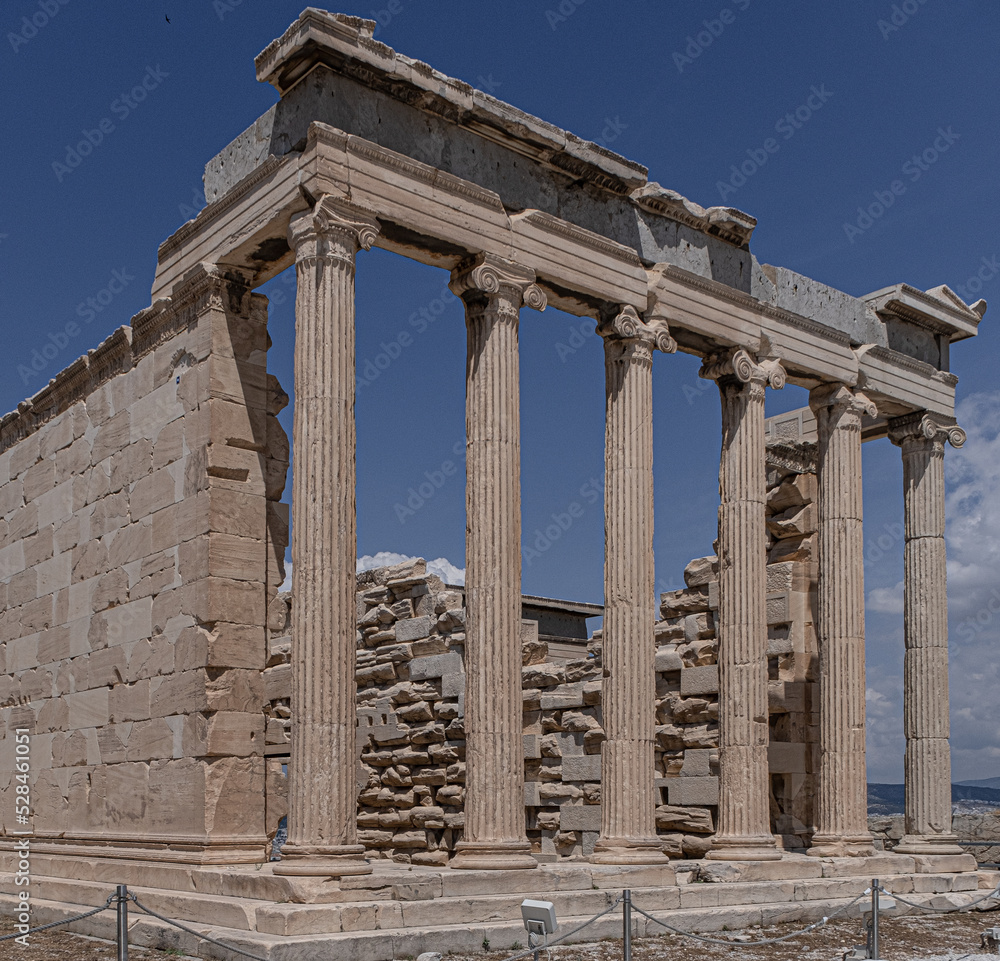 Fototapeta premium Erechtheum, the Temple of Athena Polios, an ancient Greek Ionic temple on Acropolis of Athens, dedicated to the goddess Athena, Athens, Greece