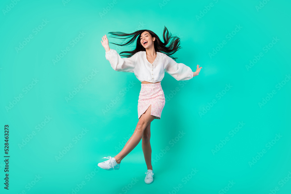 Full size photo of good mood lady enjoy loud stereo sound music rest dance isolated cyan color background