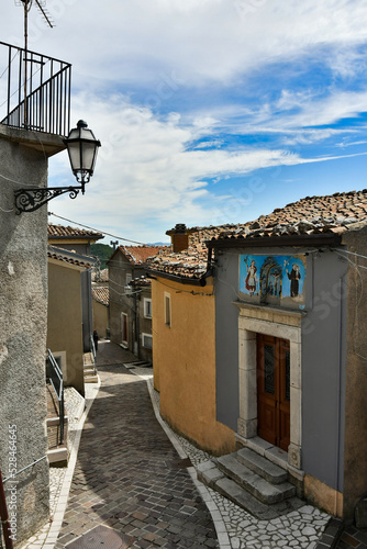 A narrow street in Castelgrande, a rural village in the province of Potenza in Basilicata, Italy. photo