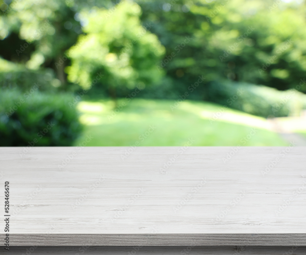 Empty white wooden surface outdoors on sunny day. Space for design Empty white wooden surface outdoors on sunny day. Space for design