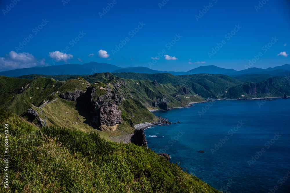 Ocean and Peninsula with Blue Sky