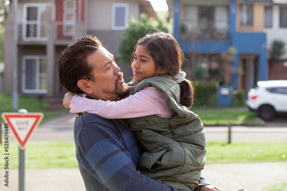 Indonesian dad carrying mixed race Asian daughter Indonesian dad carrying mixed race Asian daughter