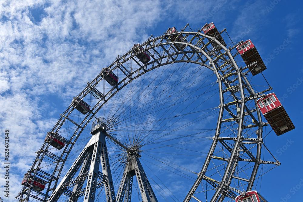 Ferris wheel in the large amusement park Ferris wheel in the large amusement park