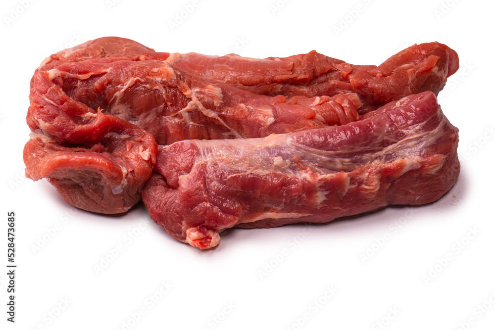 Raw pork tenderloin isolated on a white background. Raw pork tenderloin isolated on a white background.