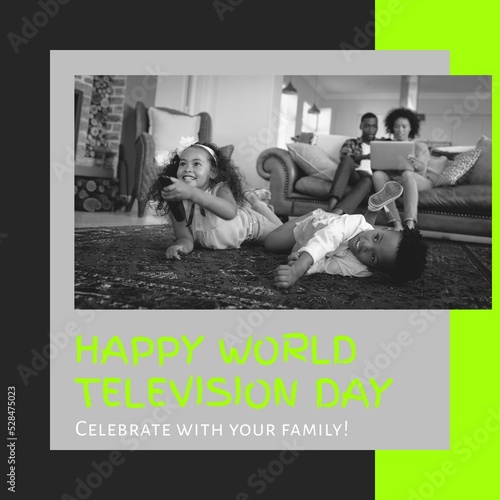 Composition of happy world television day text with african american family watching tv