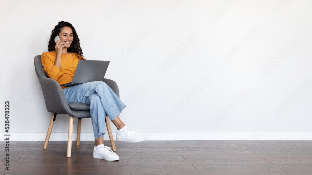 Pretty young woman looking for job online, white background Pretty young woman looking for job online, white background