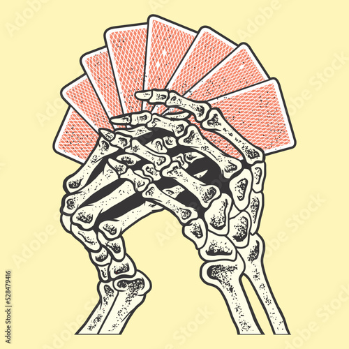 Skeleton hand holding cards 