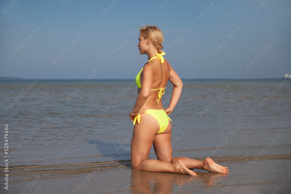 young beautiful woman in swimsuit