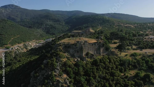 Aerial view, drone footage of an old ruins named yogurtcu castle into nature photo