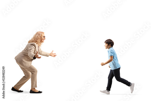 Boy running towards his mother